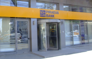 Piraeus Bank din Grecia şterge datoriile clienţilor cu probleme financiare